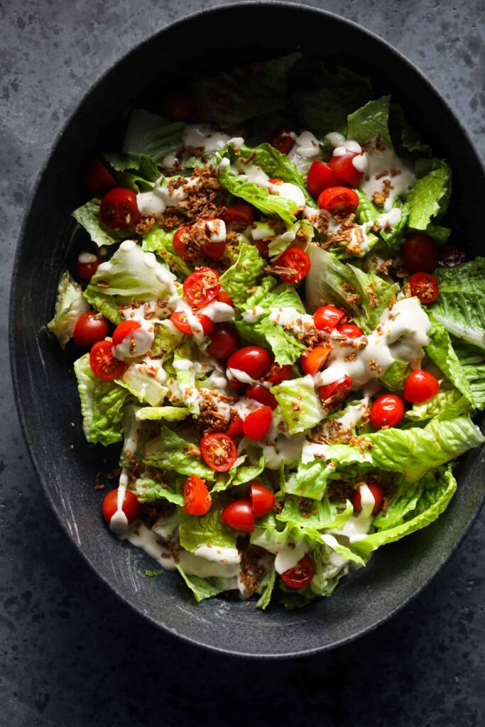 Cherry Tomato Caesar Salad with Crispy Onions