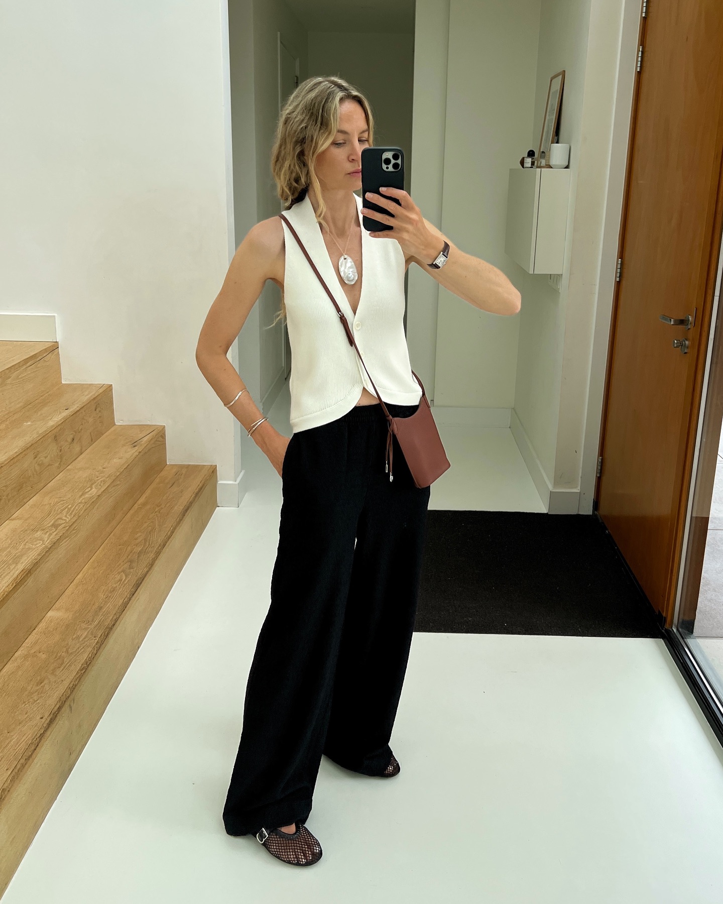 White Vest And Black Linen Pants