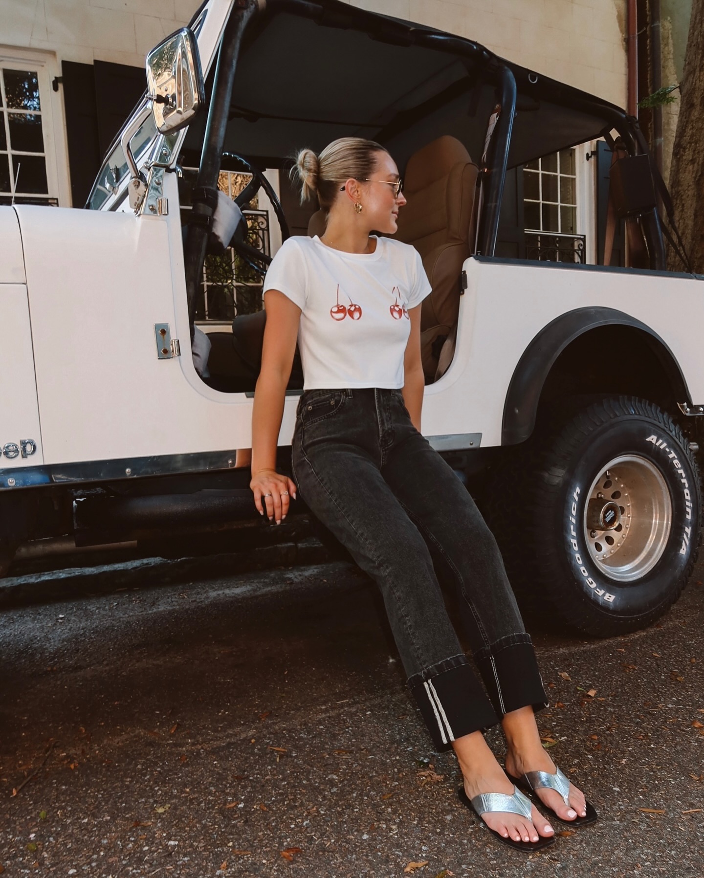 Black Cuffed Jeans With a Graphic Tee