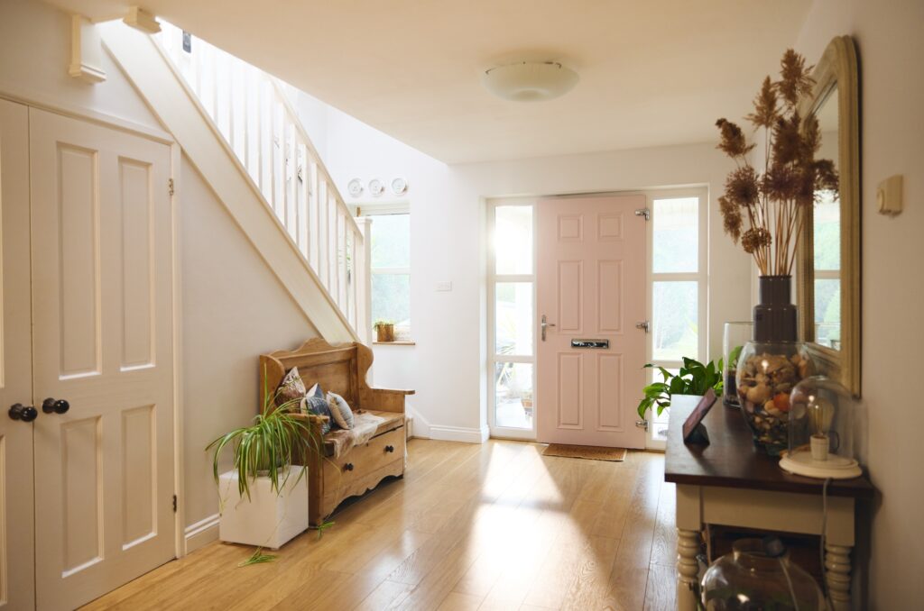 Home interior with hallway and front door