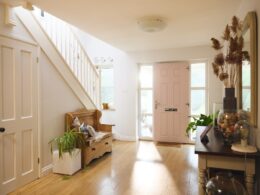 Home interior with hallway and front door