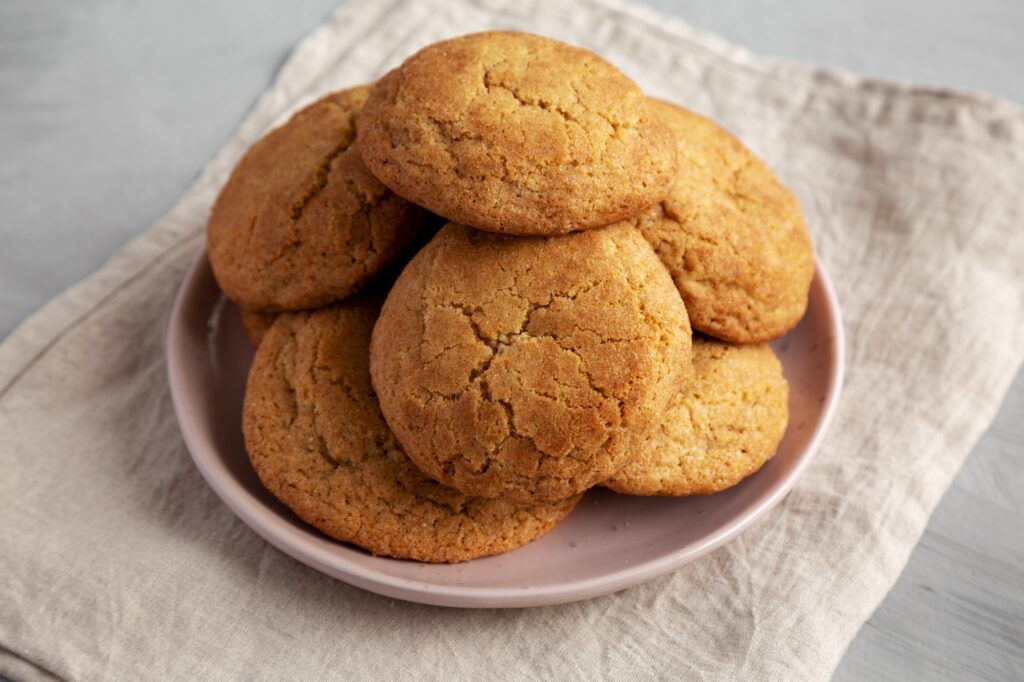 Homemade Soft And Chewy Snickerdoodle Cookies on a Plate, side view.