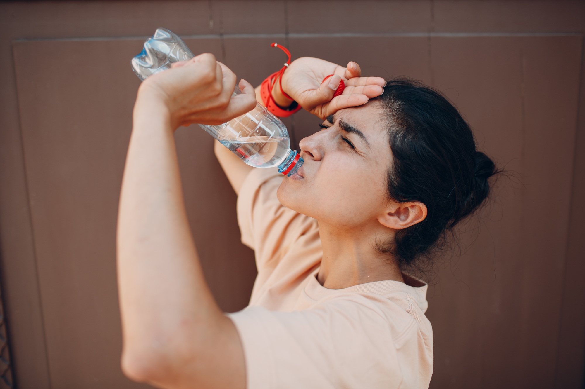 Indian woman drinking water