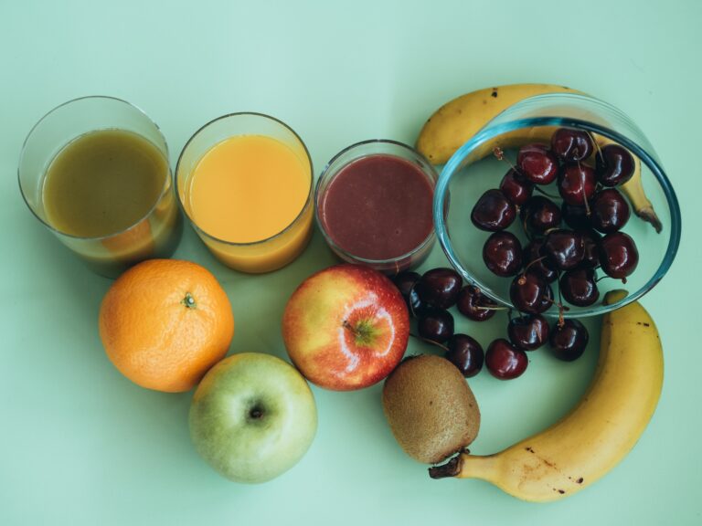 photography of different ingredients to make a healthy meal. Vegetable and fruit juices.