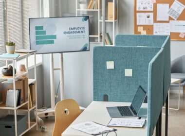 Office workplace cubicle with laptop on desk